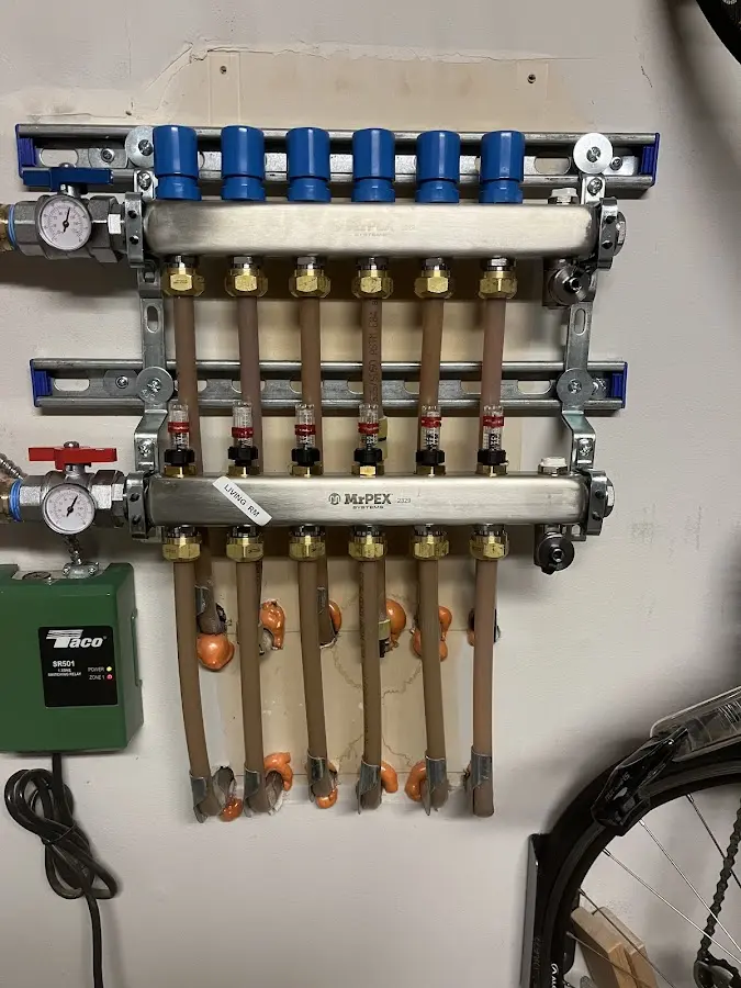 Plumber performing Gas Line Installation at a residential property in Royal Oak